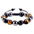 Detailed view of woven tiger eye stone bracelet with adjustable black cord and metal beads - Yellow Tiger Eye + Hematite (B3085)