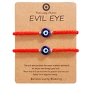 Set of two red woven evil eye bracelets with blue glass beads on card display - 2 Pack (With Display Card) / Red Evil Eye with Silver Beads (B3185)
