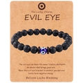 Detailed close-up of 8mm lava stone evil eye charm bracelet on kraft display card - Lucky Charm Message Style (B3238)