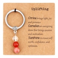Detailed macro view of natural gemstone beads with citrine and sunstone on a silver keychain - Positivity Theme - Citrine Carnelian Sunstone (M758)