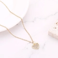 Close-up of golden heart pendant necklace with pavé micro-inlaid stones on marble - Style 10 (N1055)
