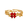 Adjustable gold ring with red heart zircon stones forming a four-leaf clover design - Gold