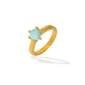 Macro detail of gold-plated ring showing six-prong setting and light blue gemstone - Light Blue