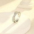 Elegant crossover ring in silver finish with pavé zircon and square-cut crystals - US 6 / Silver