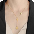 Elegant gold titanium clover tassel Y-necklace with intricate floral engraving for women - Three Flowers Tassel Gold