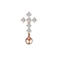 Détail macro d'un piercing de nombril en forme de croix dorée avec zircons clairs - Style Croix (2633) / Or rose