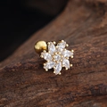 Macro detail of gold flower ear stud with marquise zircon stones and screw ball back - Flower Cluster Style (3436) / Gold