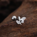 Macro shot of leaf-shaped ear cartilage stud with micro-pave cubic zirconia on wood background - Leaf Shape (3440) / Silver