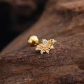 Macro view of gold-plated fan-shaped ear stud with white zircons and screw ball back - Radial Fan Style (3443) / Gold