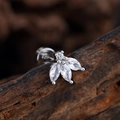 Petite silver ear stud with four sparkling zircons in flower shape on wooden base - Petal Style (3375) / Silver