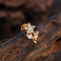 Gold flower labret stud with zircon petals and leaves on dark wood background - Floral Leaf Style (3376) / Gold