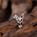 Silver butterfly cartilage stud earring with cubic zirconia on rustic wood background - Hollow Butterfly Pendant Style (3141) / Silver
