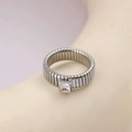 Macro shot of silver square zircon ring with flexible geometric metal band detail - Size 6 / Steel