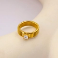 Macro shot of gold Tubogas style ring with square cut zircon and vertical ridge texture - Size 6 / Gold