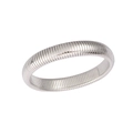 Detailed close-up of flexible Tubogas stainless steel silver bangle with ribbed texture - 18cm / 12mm / Silver