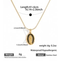 Macro detail of Virgin Mary oval pendant with black enamel on stainless steel chain - Virgin Mary Style (DKN25-374GL)