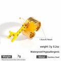 Wide hammered golden stainless steel ring with giraffe, butterfly and pearl pendants - Gold Ring (DKR25-118GL)