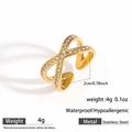 Detail of gold stainless steel X-ring with crystals, waterproof and allergy-free design - Cross X Style (DKR25-115GL)