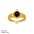 Macro detail of gold stainless steel ring featuring a black stone inlay and dimensions - Size 6 / Black Round Stone Ridged Style (CK1452) / Gold