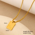 Detailed view of 18K gold plated square pendant with THE WORLD IS YOURS engraving - THE WORLD IS YOURS / Small