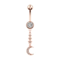 Detail of rose gold belly ring with zircon moon and star charms on white background - Rose Gold Star Moon