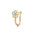 Detail of gold U-shaped non-pierced nose ring with blue gem and flower design - Blue Stone 5-Petal Flower (2727) / Gold