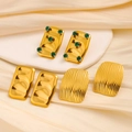 Vintage gold heart earrings set with green zircon stones on luxury display stand - Green And White Zirconia Inlaid (CK139) / Gold