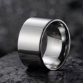 Polished tungsten carbide wide ring for men displayed on a natural gray rock background - US 7 / Silver