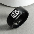 Detail of matte black titanium ring showing brushed texture and Cancer zodiac symbol - Size 6 / Cancer