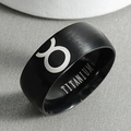 Macro detail of black matte titanium ring showing the Taurus zodiac sign and inner engraving - Size 6 / Taurus