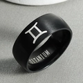 Macro detail of black matte titanium ring with engraved Gemini constellation symbol - Gemini