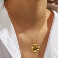Elegant gold titanium steel necklace featuring a vintage flower pendant and brown stone - Vintage Flower (DJN009L)