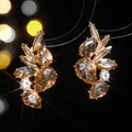Golden flower earrings with sparkling amber and clear teardrop crystals - Gold and Amber Botanical Style