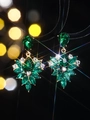 Elegant floral drop earrings with emerald green stones and gold finish base - Gold and Green Radial Pendant Style