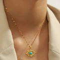 Vintage stainless steel gold necklace with turquoise evil eye pendant on a model neck - Evil Eye (DJN001GL)
