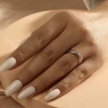 Detailed view of intertwined triple-ring design worn by a model with elegant silver finish - Adjustable Open / Silver Multi-layer Cross Style (JZ146S)