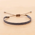 Detail of handmade ethnic woven bracelet with geometric patterns and adjustable closure - Dark Brown Blue White Rhombus (KZ-0014Q)