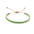 Detail of hand-woven bright green friendship bracelet with blue and gold geometric patterns - Bright Green Blue Gold Geometric (KZ-0014J)