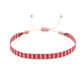 Macro view of hand-woven bohemian bracelet with red and white patterns and adjustable cord - Red White Striped (KZ-0006B)