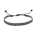 Close-up of black and white bohemian woven bracelet with geometric diamond patterns - Black White Geometric (KZ-0011A)