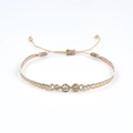 Bracelet tressé arc-en-ciel avec trois pierres de zircone dans un sertissage doré - Style Tissé Arc-en-ciel (KZ-Z0031)