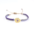 Détail du bracelet tissé bohème violet avec breloque dorée et pierre précieuse violette - Disque Pierre Précieuse Martelé Violet (KZ-Z0038)