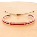 Macro shot of bohemian woven bracelet with red and silver waves and adjustable cord - Red Pink Silver Wave Style (KZ-0037)