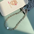 Champagne crystal beaded phone strap with iridescent accents and sleek black cord - Champagne Skull Style (SZ-A210005D)