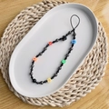 Bohemian style phone strap with colorful clay flowers, skull bead, and volcanic stone beads - Multicolor Flower and Skull Beaded Style (SZ-A220028A)