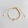 Verstelbare geweven armband met gouden kralen en schelpen letter D voor dames - Letter D (BLS220006D)