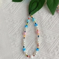 Colorful beaded iPhone wrist strap featuring blue polka dot mushrooms and faux pearls - Blue Mushroom Style (SZ-A220030B)