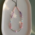 Detail view of colorful gummy bear beads and mixed acrylic spheres on phone lanyard strap - Pink And Purple Bear Style (SJ-A220017A)