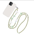 Green beaded crossbody phone lanyard with heart and cloud charms on a white phone case - Sz-a230023c