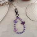 Macro detail of purple striped heart beads and handmade acrylic charms on keyring - Purple Textured Heart Beaded Style (YS-A230012G)